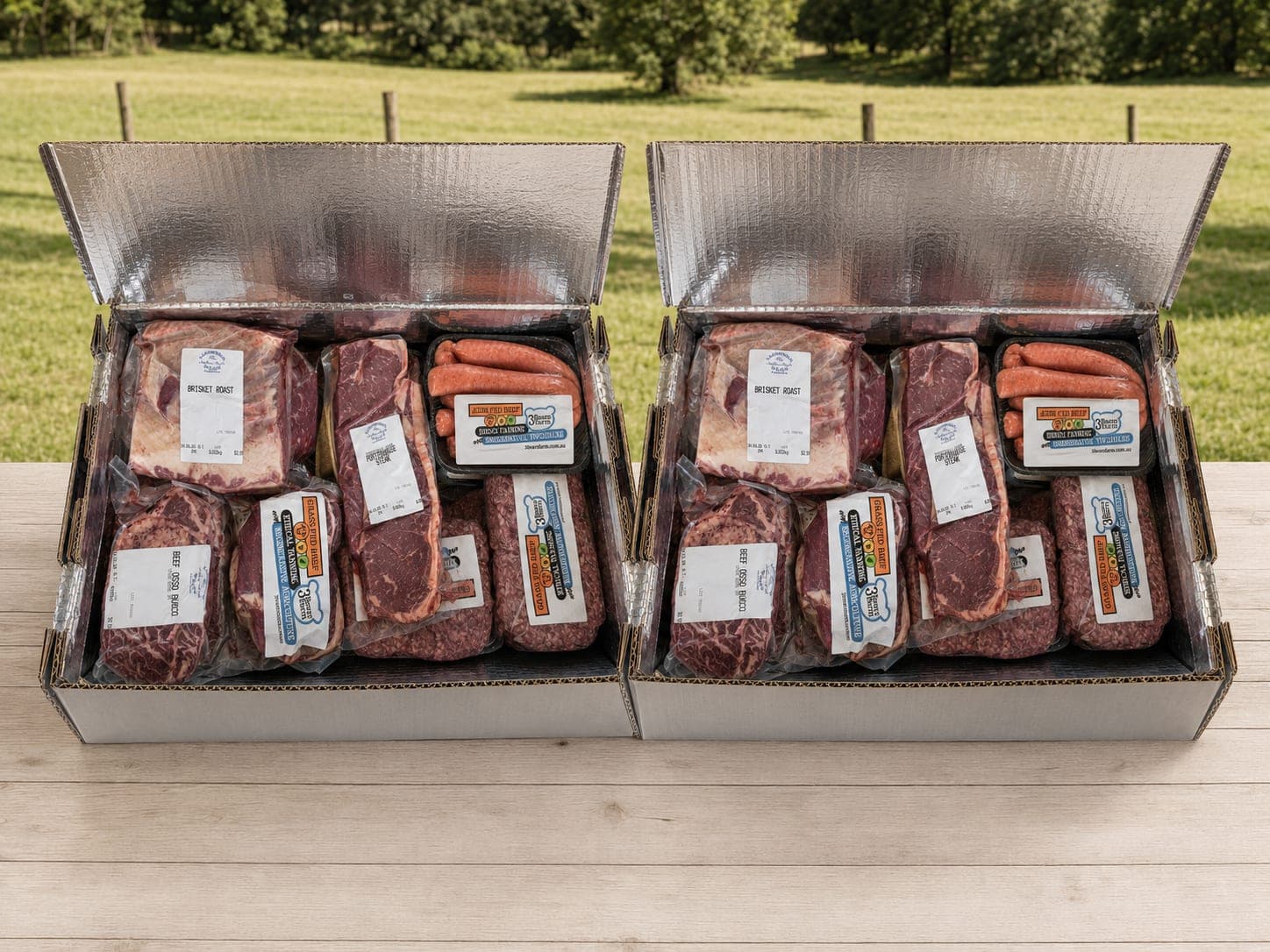 The Apocalypse Hamper: two full insulated boxes of labelled 3 Bears Farm cuts, side by side — roasts, steaks, osso bucco, sausages and mince